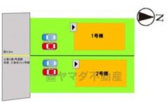 1号棟。カースペースは停めやすい並列駐車2台付き。